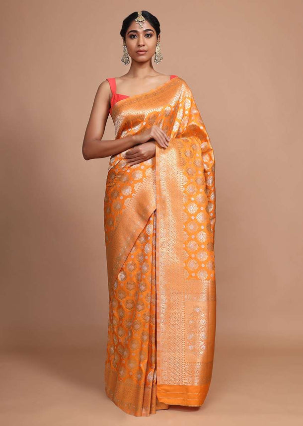 Orange art handloom Saree In Silk With Weaved Floral Buttis