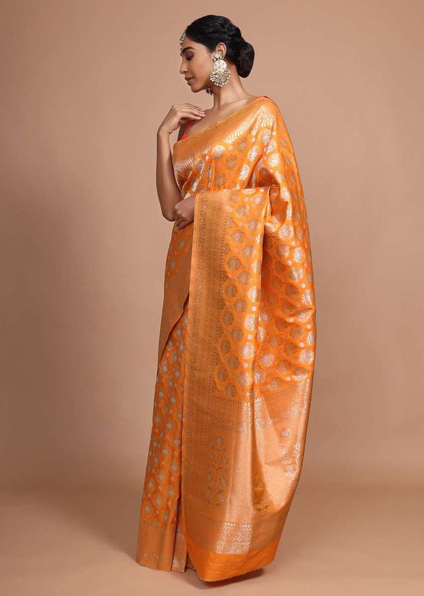 Orange art handloom Saree In Silk With Weaved Floral Buttis