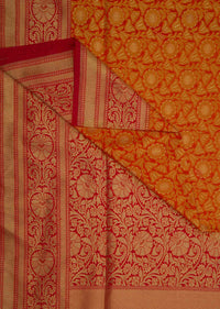 Orange brocade saree in floral motif