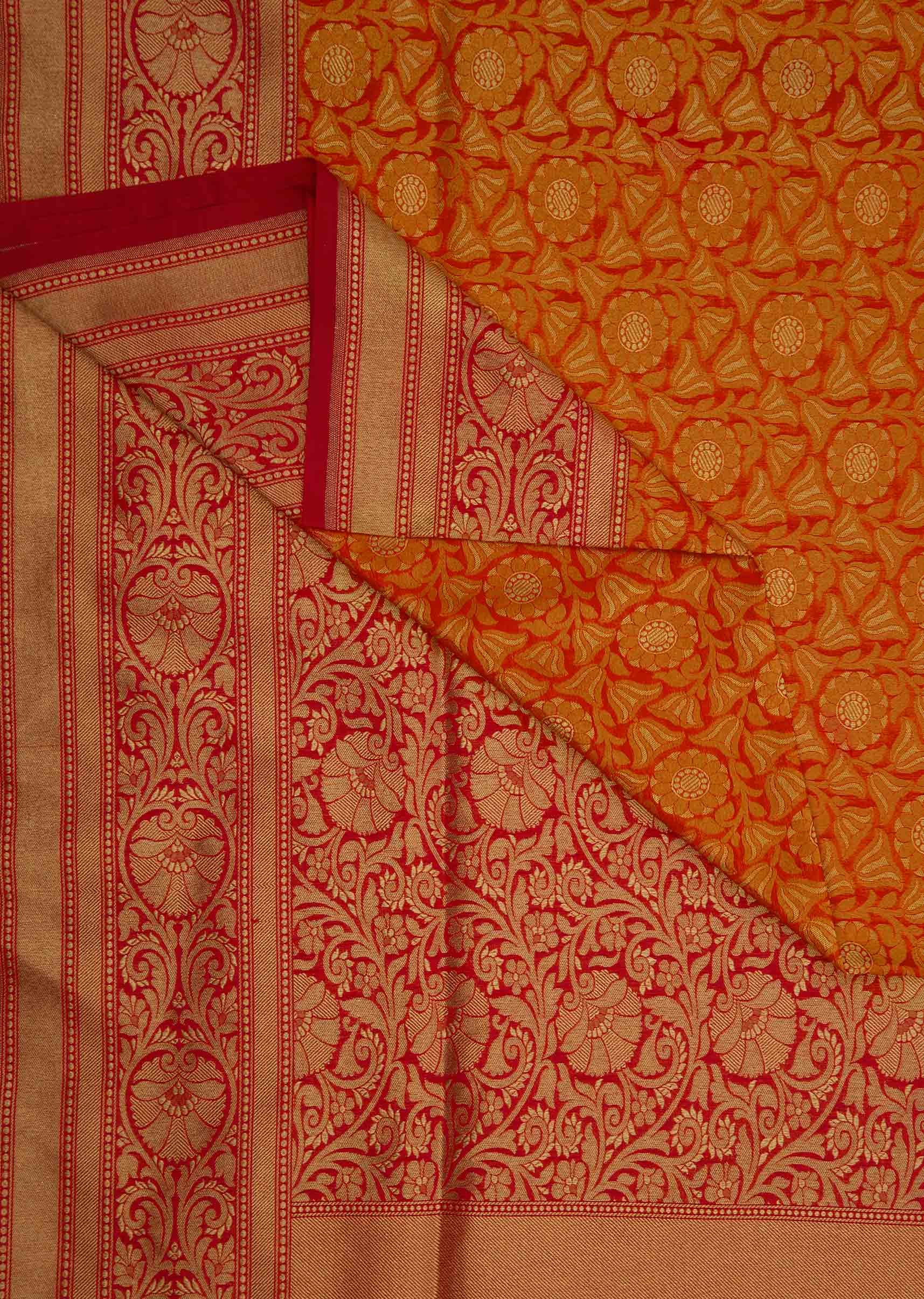 Orange brocade saree in floral motif