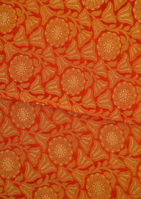 Orange brocade saree in floral motif