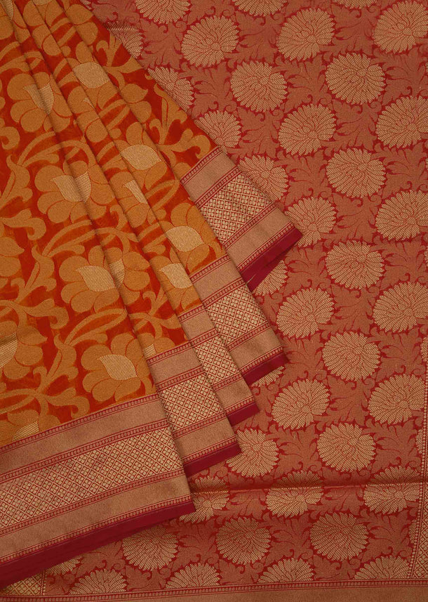 Orange brocade saree in floral motif