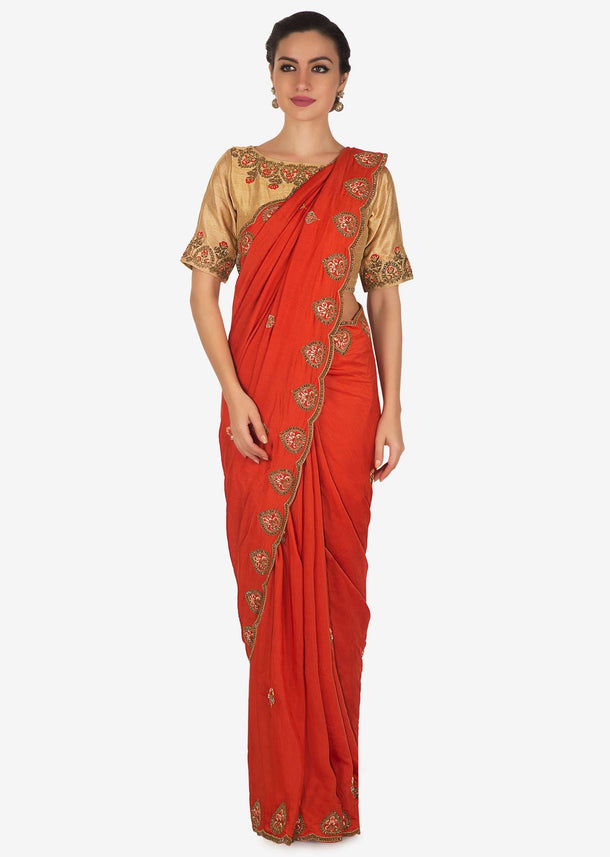 Orange saree in cotton silk with cut dana and resham embroidered scalloped border only on Kalki