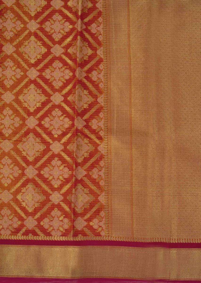 Orange tussar silk weaved saree in geometric motif 