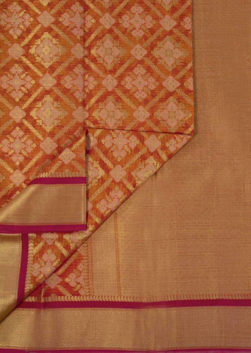 Orange tussar silk weaved saree in geometric motif 