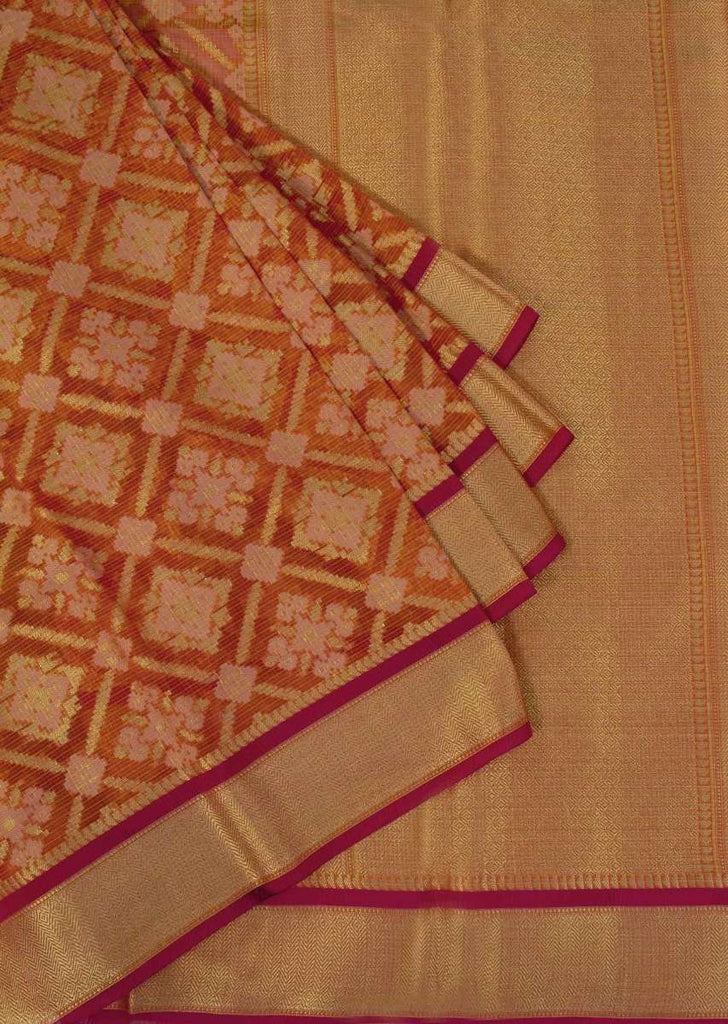 Orange tussar silk weaved saree in geometric motif 