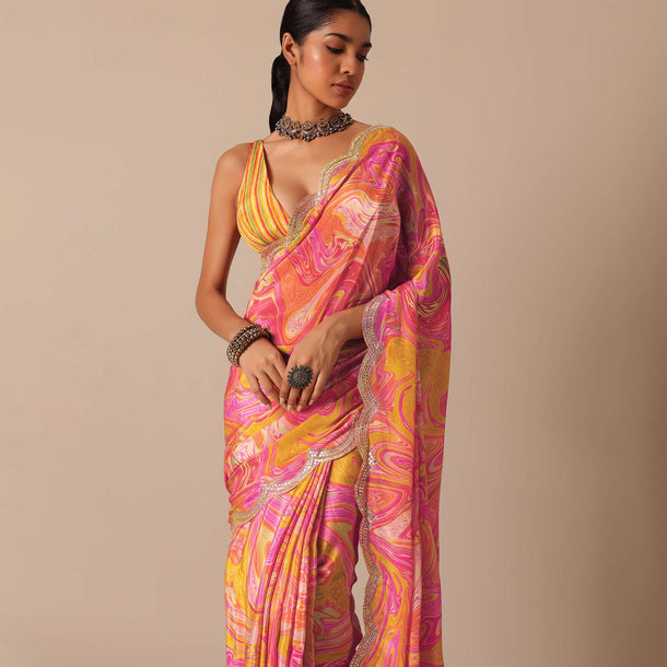 Orange Muslin Saree With Kaleidoscope Prints And Unstitched Blouse Piece
