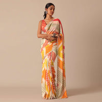 Orange Muslin Saree With Mirror Scallop Border And Unstitched Blouse Fabric