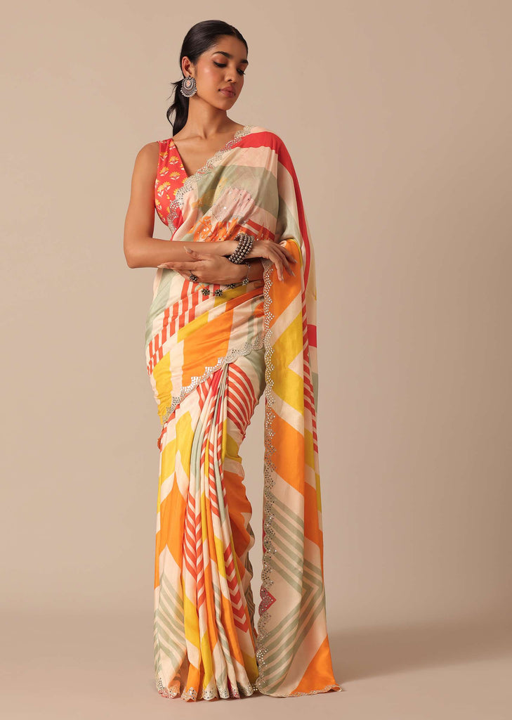 Orange Muslin Saree With Mirror Scallop Border And Unstitched Blouse Fabric