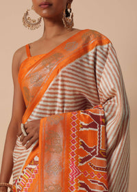 Orange Patola Printed Saree In Dola Silk With Foil Detail Pallu And Unstitched Blouse Piece