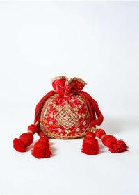 Orange Potli Bag In Silk With Bandhani Print And Gotta Patti Embroidery