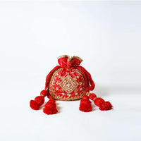 Orange Potli Bag In Silk With Bandhani Print And Gotta Patti Embroidery