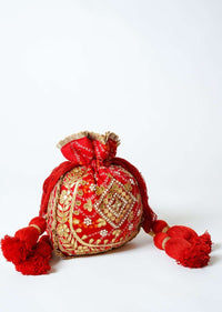 Orange Potli Bag In Silk With Bandhani Print And Gotta Patti Embroidery