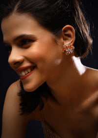 Orange Stone Studded Floral Stud Earrings With Swarovski Accents