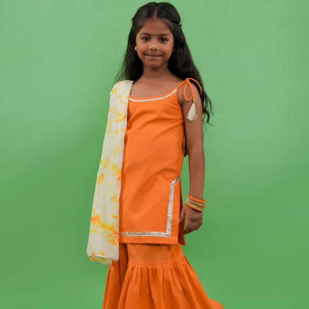 Kalki Girls Orange Strappy Straight Cut Sharara Suit With Gotta Patti Work And A Tie Dye Dupatta By Tiber Taber