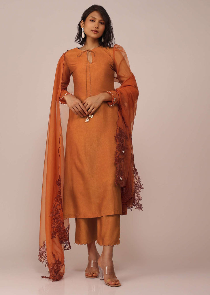 Orange Suit Set In Art Silk With Tassles On The Sleeves And Dupatta