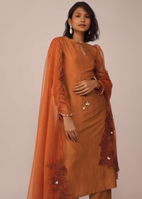 Orange Suit Set In Art Silk With Tassles On The Sleeves And Dupatta