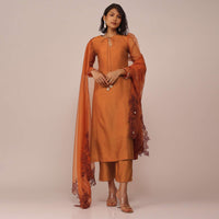 Orange Suit Set In Art Silk With Tassles On The Sleeves And Dupatta