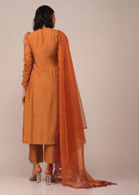 Orange Suit Set In Art Silk With Tassles On The Sleeves And Dupatta