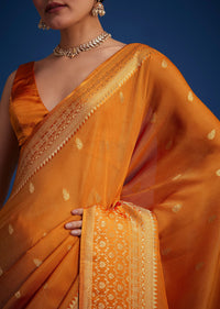 Orange Tissue Silk Saree With Zari Border And Butti Work