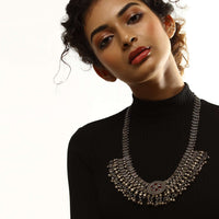 Oxidised Long Necklace With Floral Centre Adorned In Red Stones And Ghungru Tassels