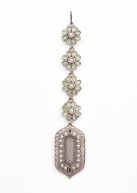 Oxidised Silver Mangtika With Carved Ethnic Motif Studded In Green Stones And Pearls