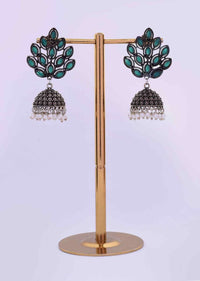 Oxidized jhumkas with emerald green beads only on Kalki