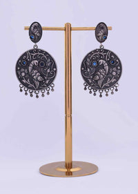 Oxidized self carved dangler earring in peacock motif only on Kalki