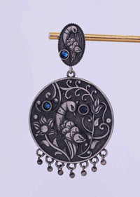 Oxidized self carved dangler earring in peacock motif only on Kalki