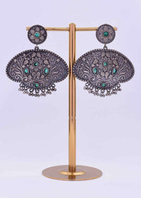 Oxidized self carved dangler in floral moti with green beads only on Kalki