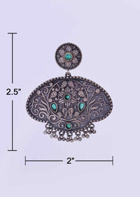 Oxidized self carved dangler in floral moti with green beads only on Kalki