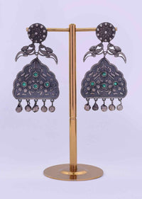 Oxidized self carved metal dangler with emerald green bead only on Kalki