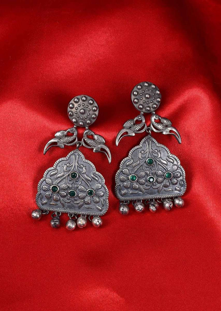 Oxidized self carved metal dangler with emerald green bead only on Kalki