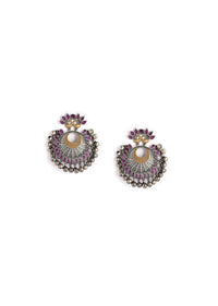 Oxydised Danglers With Carved Peacock Motif Along With Magenta Semi Precious Stones And Ghungru Tassels