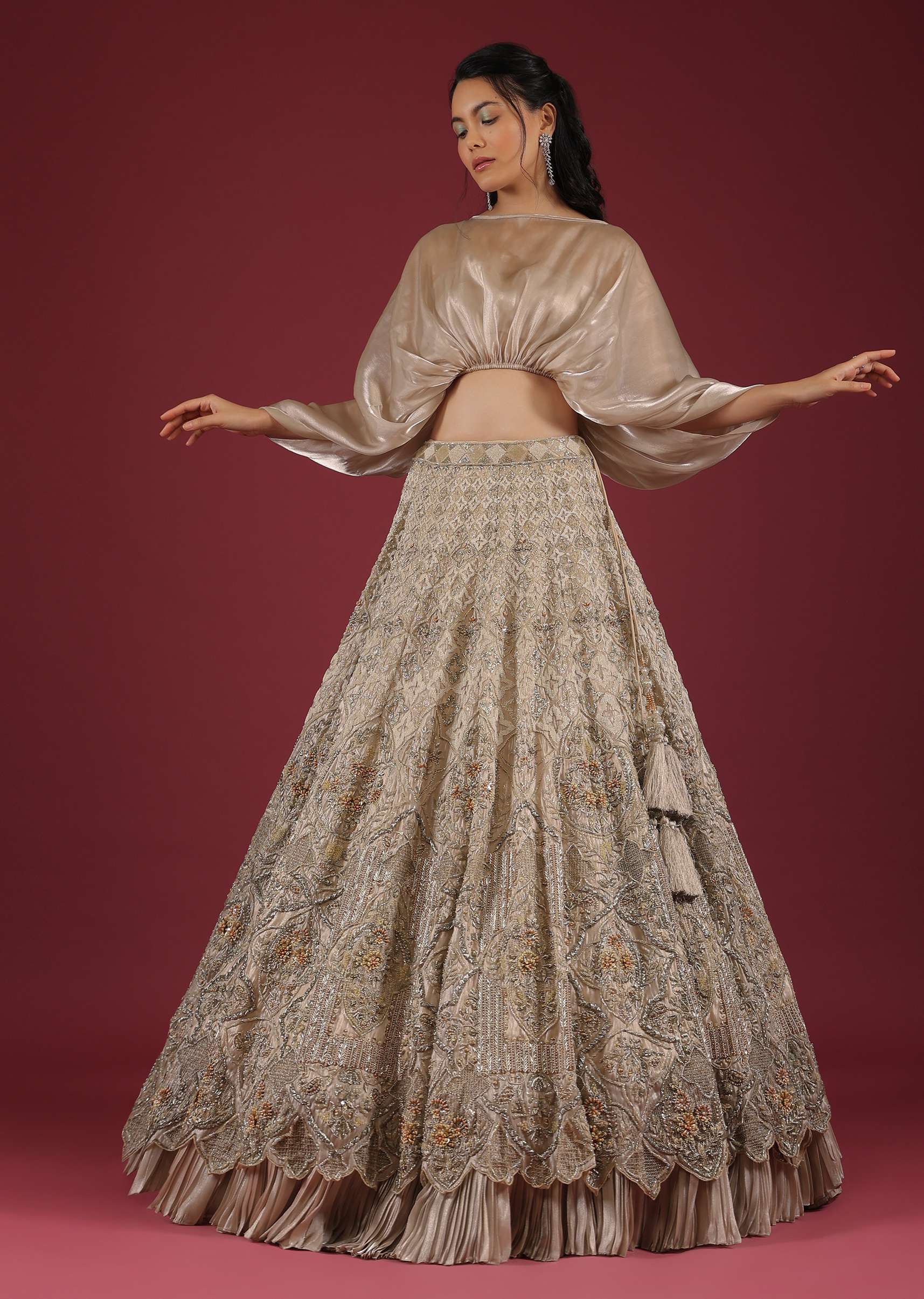 Oyster Lehenga With An Organza Cape Top And Cut Dana Handwork On The Lehenga