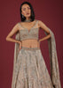 Oyster Net Lehenga And Crop Top With 3D Petal Motifs And An Open Back