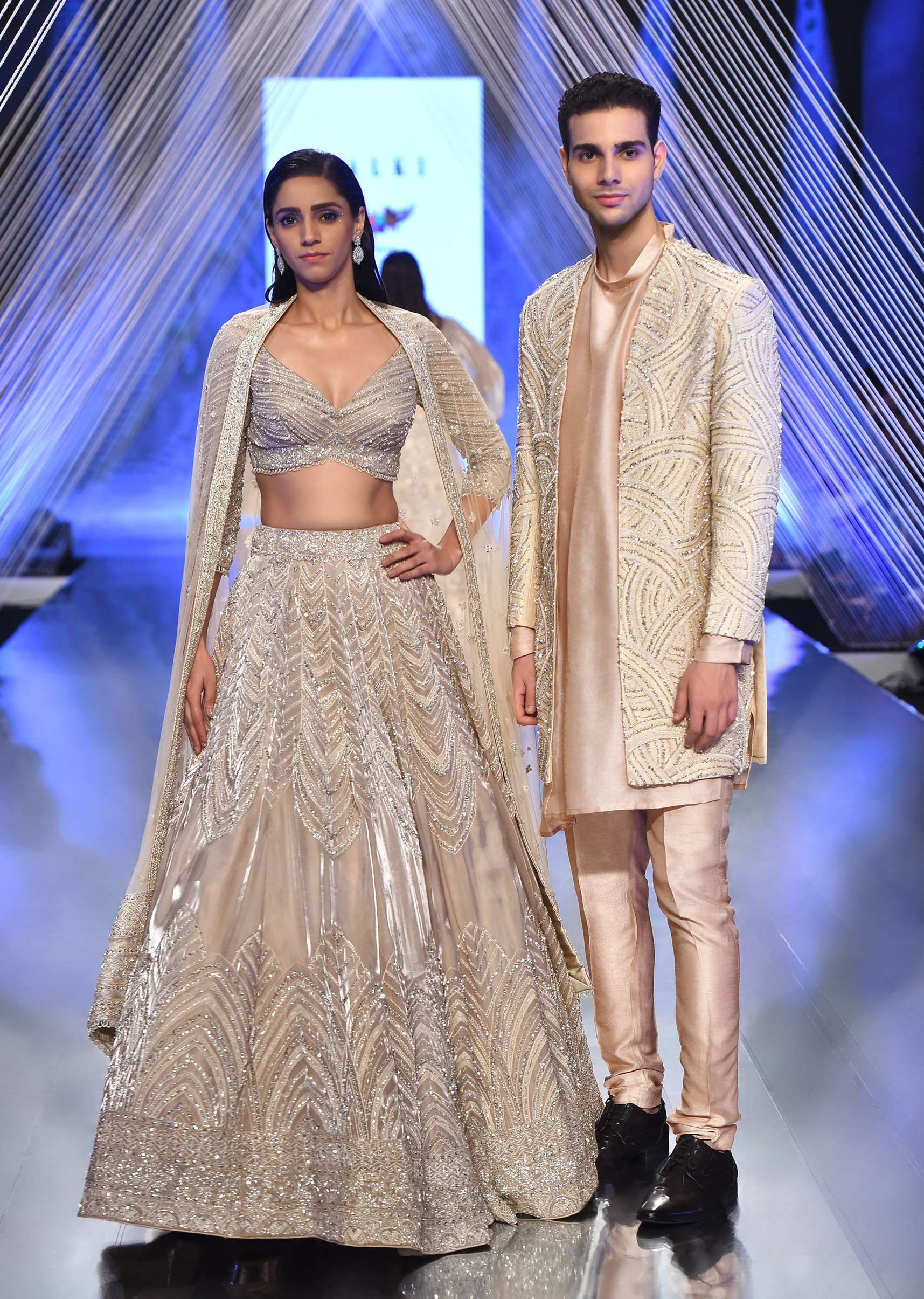 Oyster Organza Lehenga Adorned With Cut Dana Embroidery And A 3/4Th Sleeves Crop Top With A Deep V Neckline