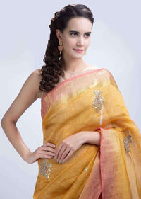 Paisley motif pink meenakari earring  with kundan stone enhancing the border only on kalki