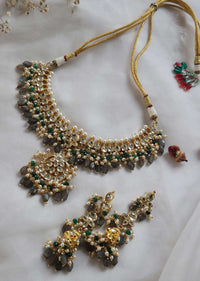 Gold Toned Polki Necklace And Earring Set With Green Onyx Stones