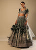 Palace Green Lehenga Choli In Velvet With Short Puff Sleeves And Multi Colored Hand Embroidery In Floral And Geometric Motifs