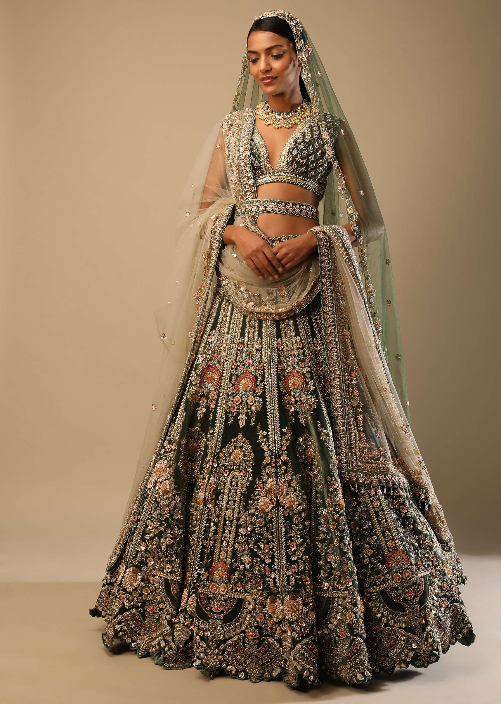 Palace Green Lehenga Choli In Velvet With Multi Colored Hand Embroidered Heritage Kalis With Hints Of Flowers