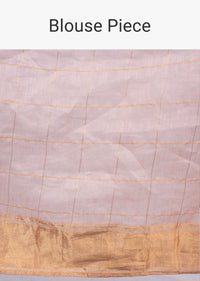 Pale peach linen saree with cut dana and zari butti only on Kalki