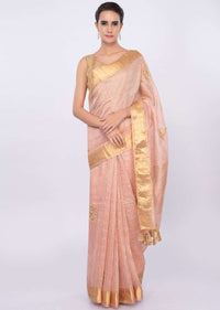 Pale peach linen saree with cut dana and zari butti only on Kalki