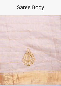 Pale peach linen saree with cut dana and zari butti only on Kalki