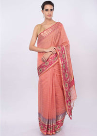 Pale peach linen saree with faded pink line  only on Kalki