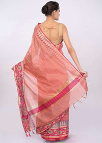Pale peach linen saree with faded pink line  only on Kalki