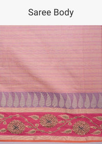 Pale peach linen saree with faded pink line  only on Kalki