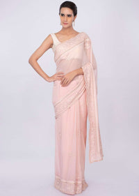 Pale pink georgette saree with self floral embroidery and butti only on kalki