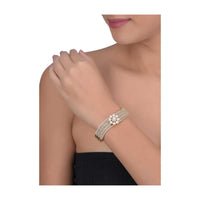 Gold Plated Wave Shaped Bracelet Adorned With Pearls And Stones Online - Kalki Fashion