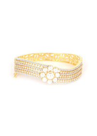 Gold Plated Wave Shaped Bracelet Adorned With Pearls And Stones Online - Kalki Fashion